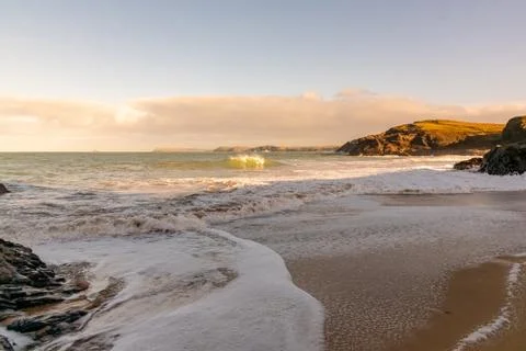 Golden light on Cornish beach Stock Photos