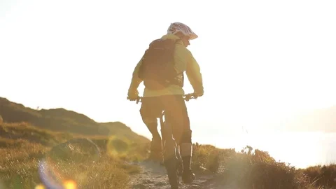 Golden Light Mountain Biker Video stock 90861585