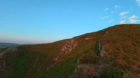 Golden light paints rugged cliffs and green valleys. Soko Grad, Serbia 動画素材 345897143