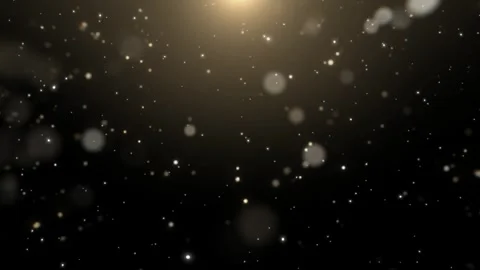 Golden light particles falling on black background Video stock 337087025
