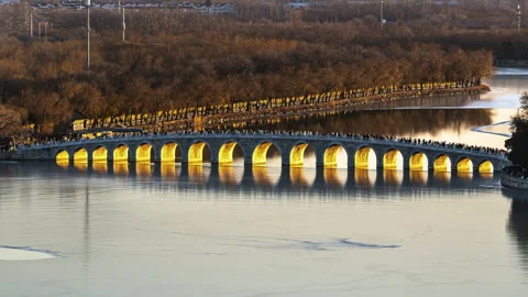 The Golden Light Piercing Through the Arch at the Summer Palace in Beijing, Chin Stock Footage 300123406