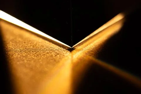 Golden Light Reflection on Textured Surface with Sharp Edge イラスト素材