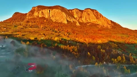 Golden Light on Rocky Mountain Range Stock Footage 322829124