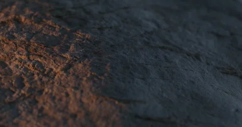 Golden Light on Rough Stone Texture. Stock Footage 272579009