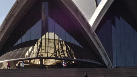Golden light seen through Sydney Opera House window slow motion 4K Stock Footage 201454593