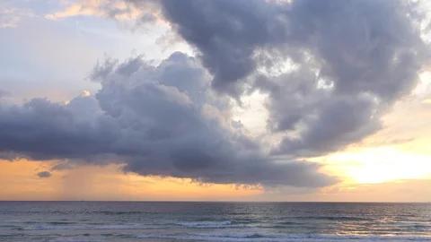 The golden light of the sunset on the beach Видео 116416852