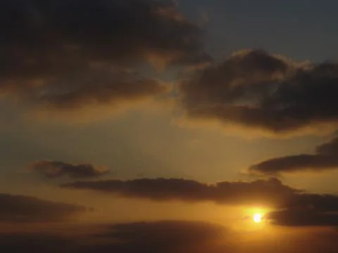 Golden light sunset view of a cloudy sky Foto stock