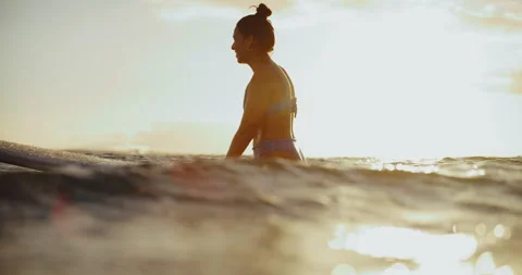 Golden Light Surfing at Sunset Stock Footage 202098019