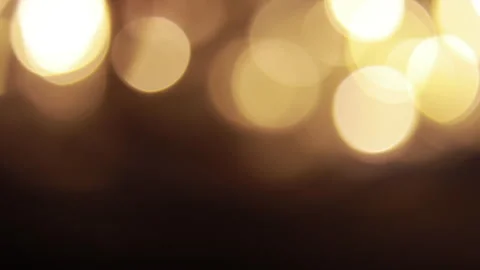 Golden lights with constant light moving in the background and turning off 库存影片 309347591