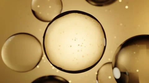 Golden Liquid Bubbles in Abstract Background Stock Footage 298600923