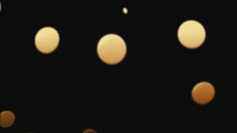 Golden liquid drops floating in dark space with subtle light reflections se.. Stock Footage 341652571