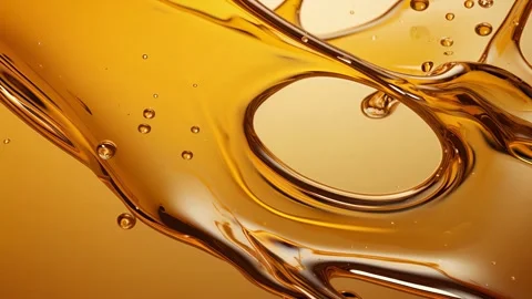 Golden liquid flows in rings Stock Footage 317292611