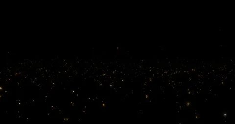 Golden looping particles moving past camera floating up into the sky Video stock 342740031