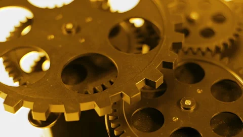 Golden Mechanical Gears Rotating Macro Industrial Engineering Concept Stock Footage 331618158