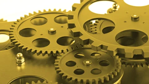Golden Metallic Gear System with Interlocking Cogs Stockbeeldmateriaal 340937422