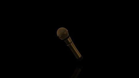 Golden Microphone turns on itself - loop animation - black background Stock Footage 255464073