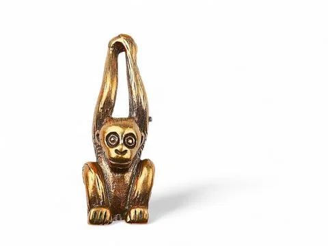 Golden monkey statue on white background Stock Photos