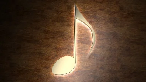 Golden musical note glows on the table. The magic of music. 94. Video stock 133329175
