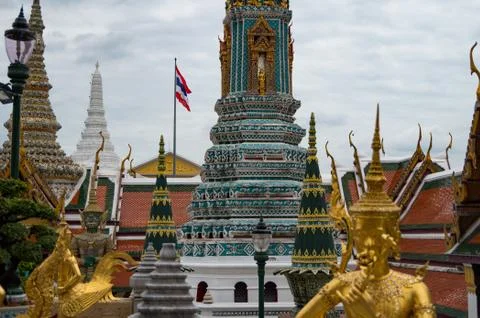 Golden, mythical statue with gemstones in the Grand Palace of Bangkok, Thaila Stock Photos