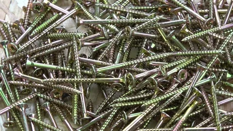 Golden new screws tools  rotating background Stock Footage 77612371