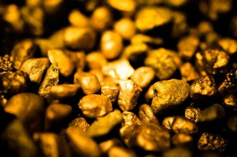 Golden nuggets close-up Stock Photos