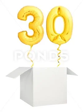 Golden number thirty balloon flying out of blank white box isolated on white Stock Photos
