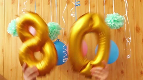 Golden numbers eighty 80 - air balloons and colorful decorations Stock Footage 193113068