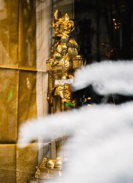 Golden Nutcracker in Festive Window Display Stock Photos