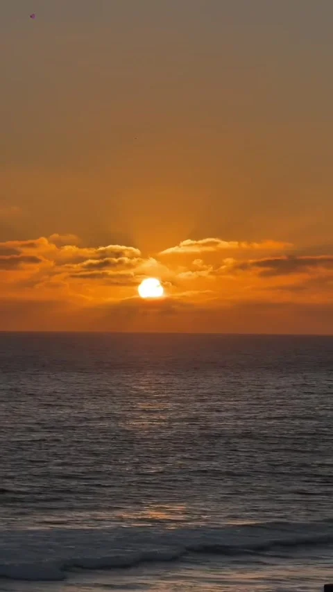 Golden Ocean Sunset with Clouds and Waves Stock Footage 339584168