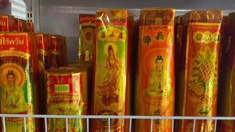 Golden packages of incenses on display in the devotion store in Thailand. Stock Footage 204963568