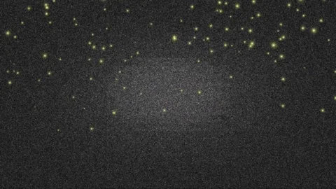 Golden Particles Floating on Dark Grey Textured Background Animation Clip Stockbeeldmateriaal 331616292