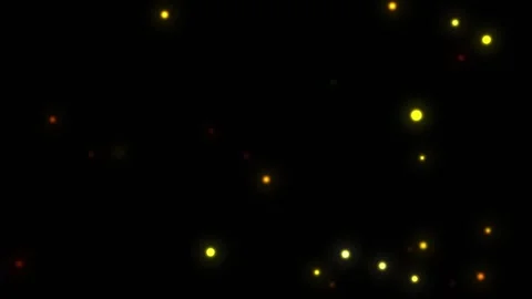 Golden particles floating in darkness with subtle light bloom cinematic mot.. Stock Footage 340914059