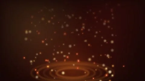Golden particles rising from glowing concentric ripples Stock Footage 336351947