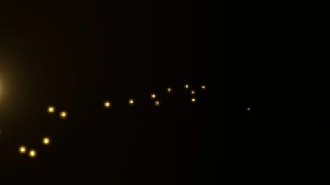 Golden particles stream through a dark tunnel-like space Stock Footage 329301497