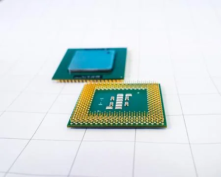 Golden pins of a computer processor on a white background. 写真素材