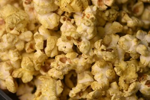 Golden Popcorn Macro Pattern Showcasing Savory Crunchy Snack Detail Stock Photos