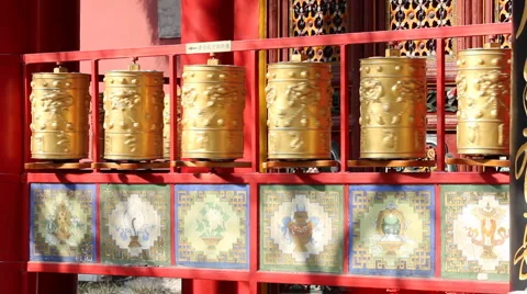 Golden prayer wheels in the sunlight Stock Footage 1807255