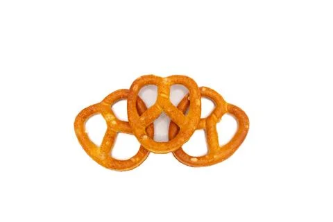 Golden pretzel knots 3d render isolated on white background for bakery and snack Stock Photos