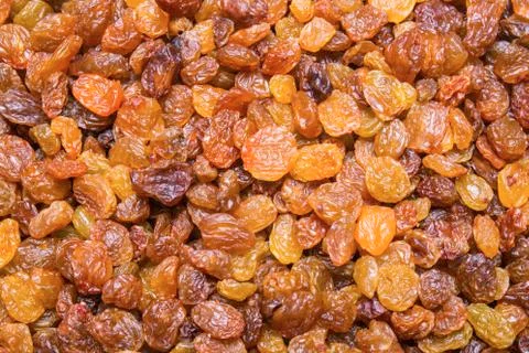 Golden Raisins background, texture Stock Photos