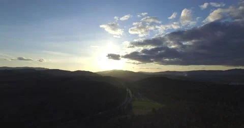 Golden Rays of Light Stream Down to the Freeway Below 库存影片 62493589