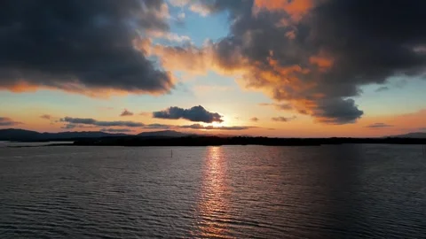 Golden Rays Through Clouds at Dusk Stock Footage 340305340