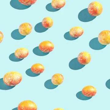 Golden red eggs. Pattern at blue background. Easter concept Stock Photos