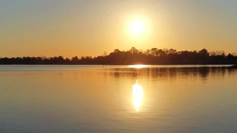 Golden reflection of sun on Water, right after sunrise Stock Footage 105483976