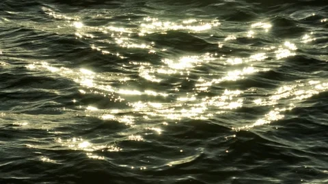 The golden reflection on the water's surface. Stock Footage 307775357