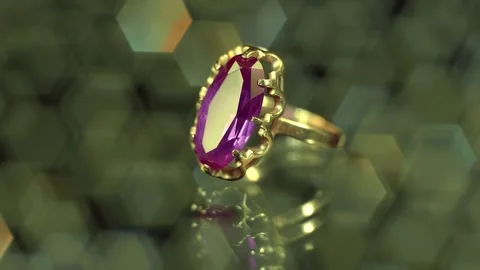 A golden ring with a large red ruby sparkles in the light  Stock Footage 259870067