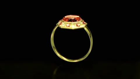 Golden ring with red ruby gems rotate, isolated, fictive - loop video Stock Footage 194558555