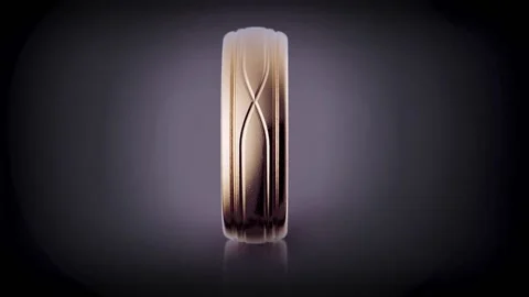 Golden ring spinning on dark background Stock Footage 231487552