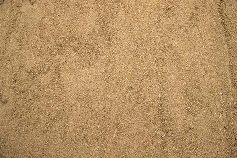 Golden Sand  texture may be used as a background wallpaper Stock Photos