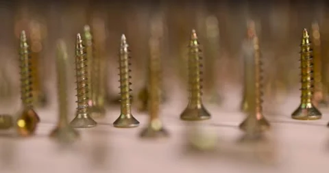 Golden self-tapping screws for installation and construction work with wood, Stock Footage 281211621