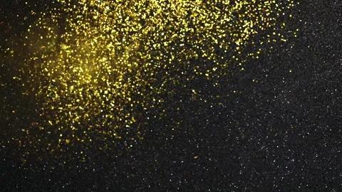 Golden sequins fall on a black glitter background Stock-Footage 220521543